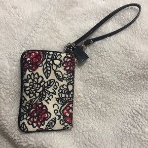 COACH floral print wristlet *slightly damaged*